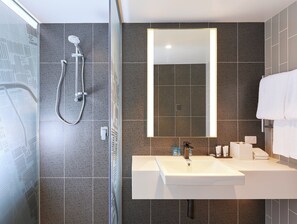 Shower, hydromassage showerhead, eco-friendly toiletries, hair dryer