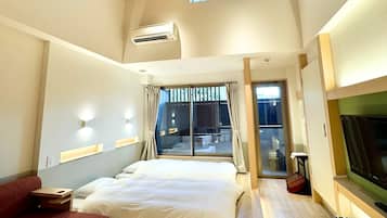 1 habitación, cubrecamas y caja de seguridad en la habitación