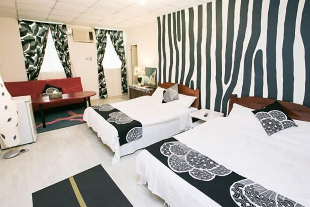 Chambre Quadruple Ville | Bureau, rideaux occultants, chambres insonorisées, Wi-Fi gratuit