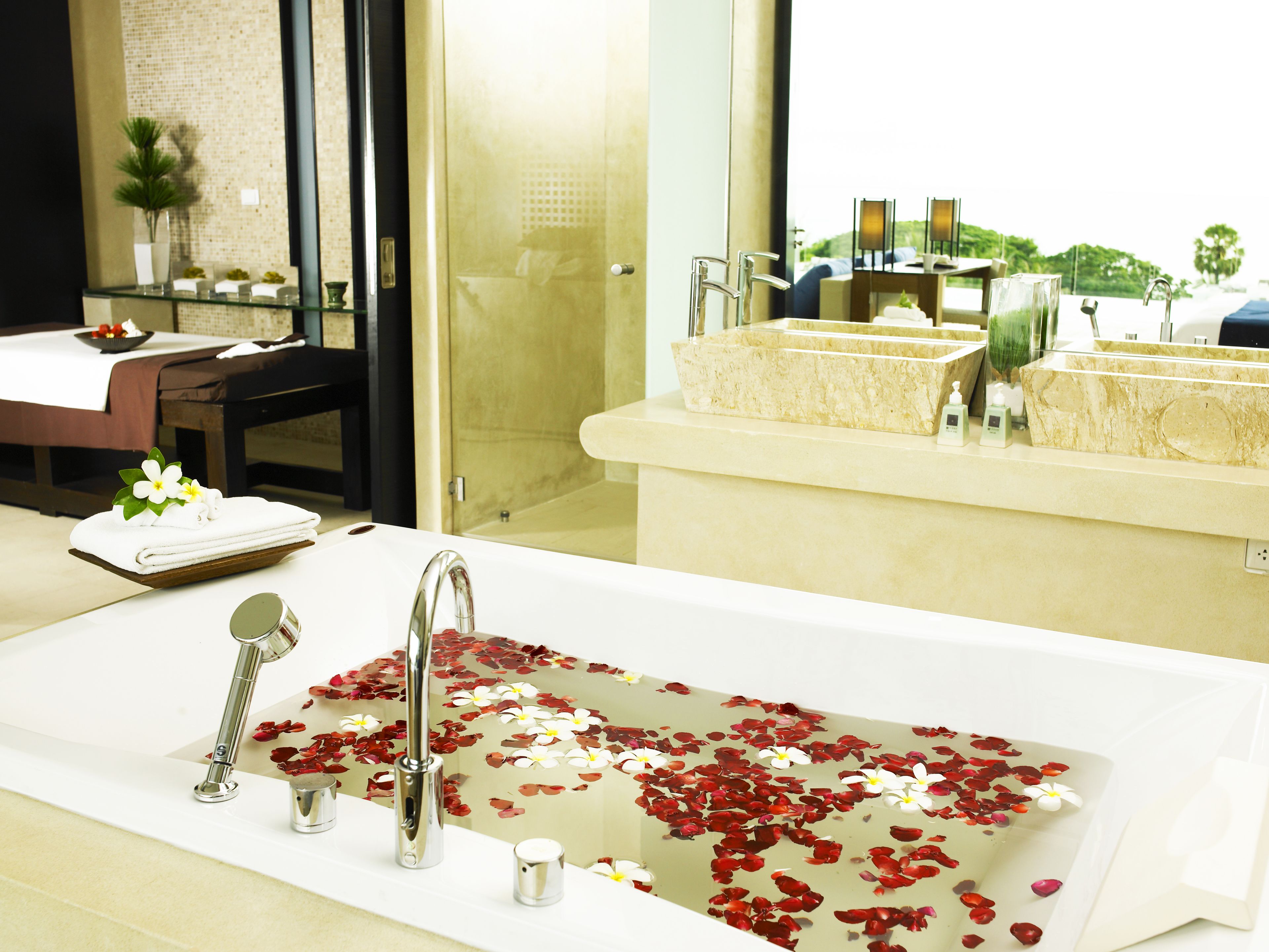 Jetted tub, designer toiletries, hair dryer, bathrobes