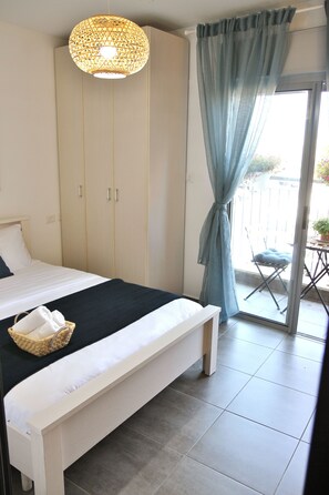 1 chambre, fer et planche à repasser, Wi-Fi gratuit, draps fournis