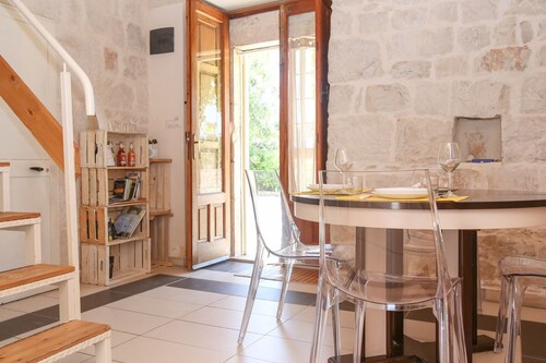 The terrace overlooking the olive trees - loft Moresca