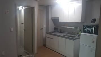 Family Room (A Type) | Private kitchen | Fridge, microwave, stovetop, rice cooker