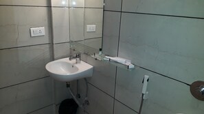 Basic Double Room Single Use, 1 Bedroom | Bathroom | Shower, rainfall showerhead, free toiletries, hair dryer - Hotel SVR (Patna)