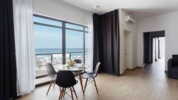 Apartment (VIP) | Living area | Flat-screen TV