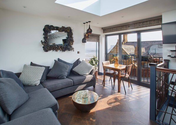 Luxury Apartment, Multiple Beds (Beach View) | Living area | Flat-screen TV