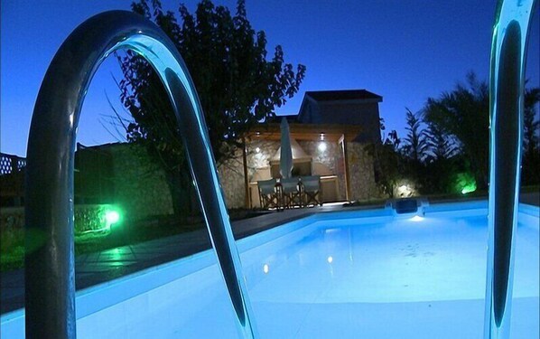 Seasonal outdoor pool, pool umbrellas, pool loungers