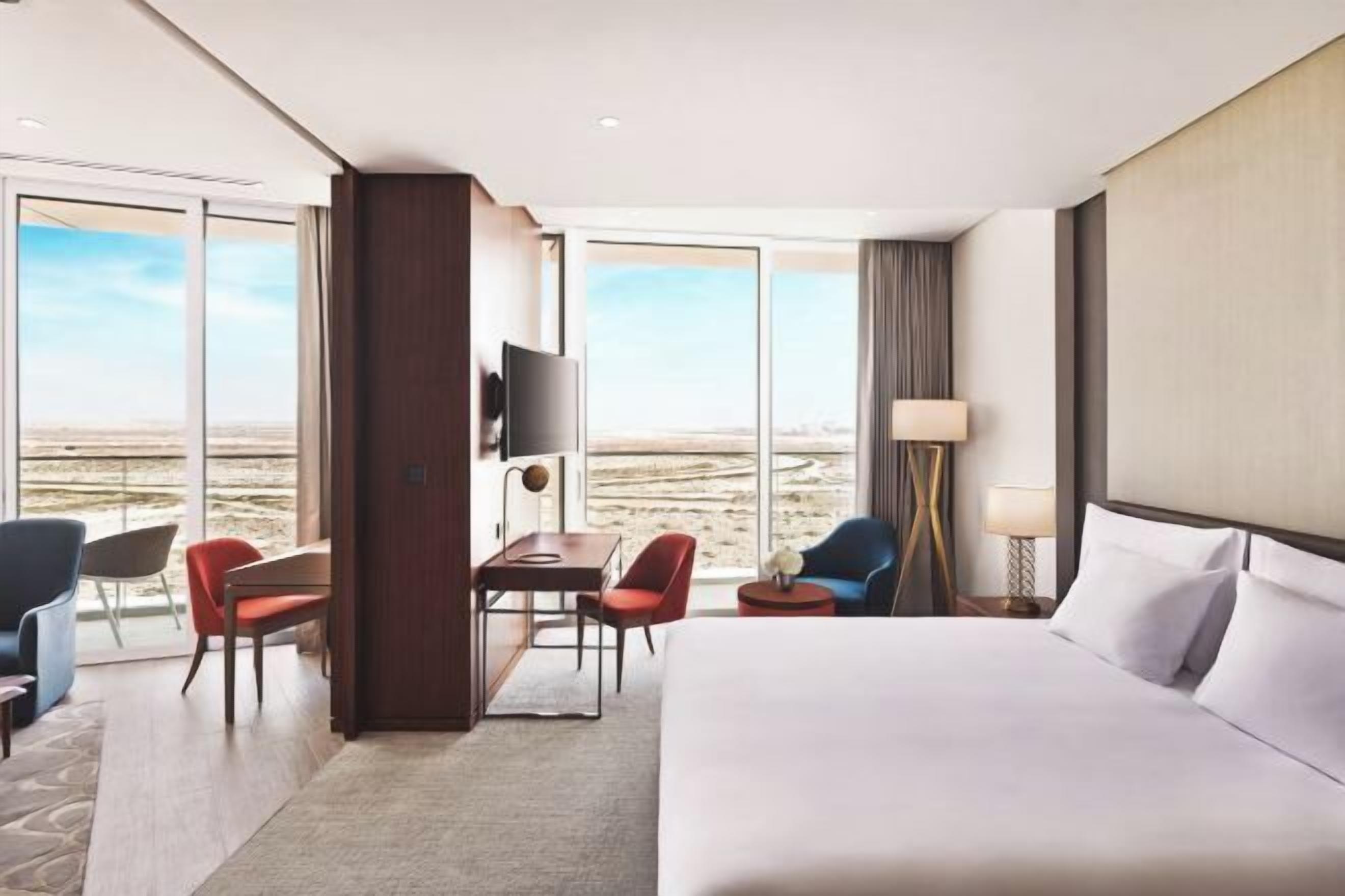 Premium bedding, down comforters, minibar, in-room safe