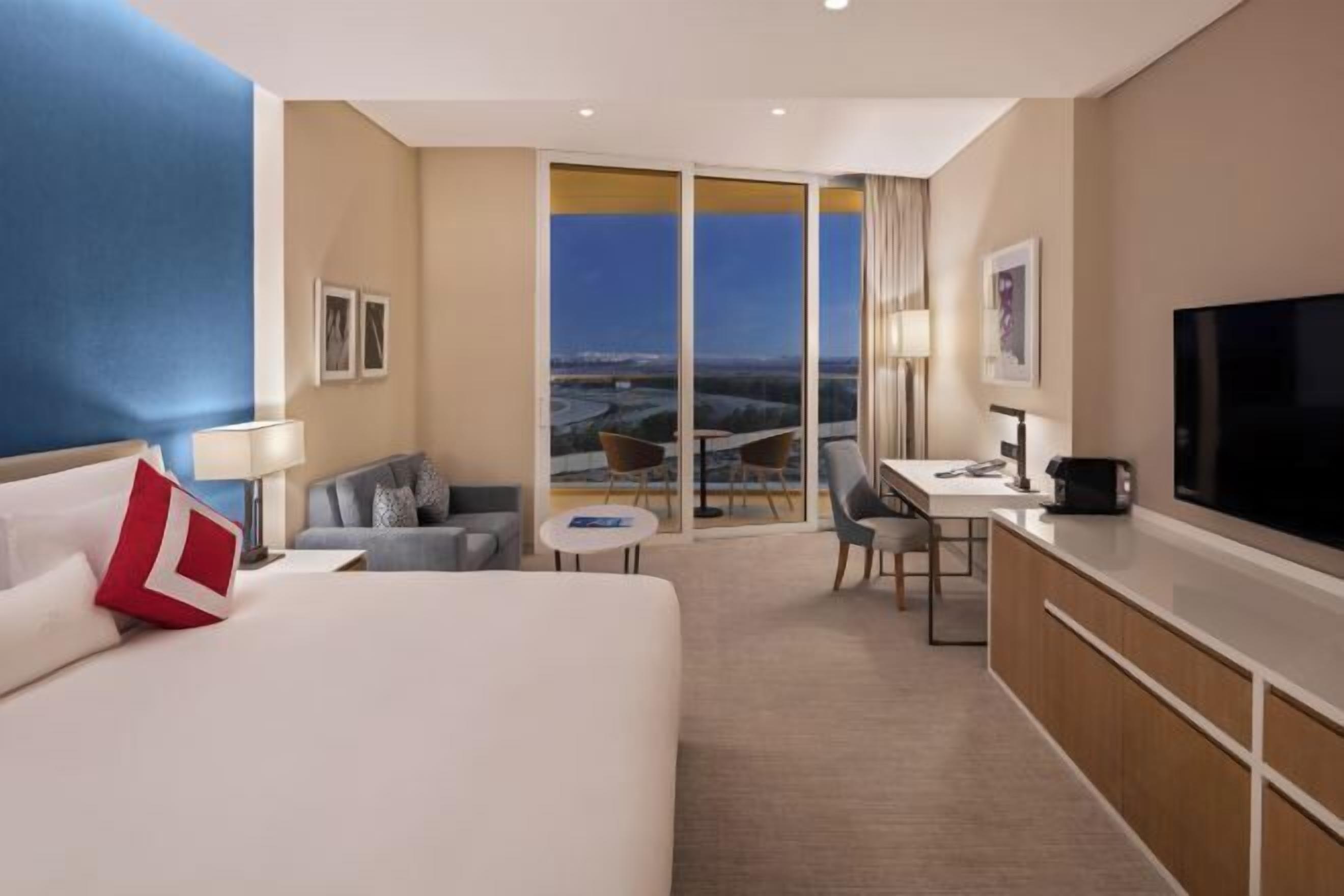 Premium bedding, down comforters, minibar, in-room safe