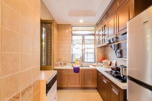 Villa | Private kitchen | Fridge, microwave, stovetop, dishwasher