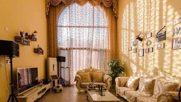 Villa | Wohnbereich | Flachbildfernseher