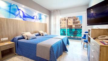 Caja fuerte, escritorio, wifi gratis y ropa de cama