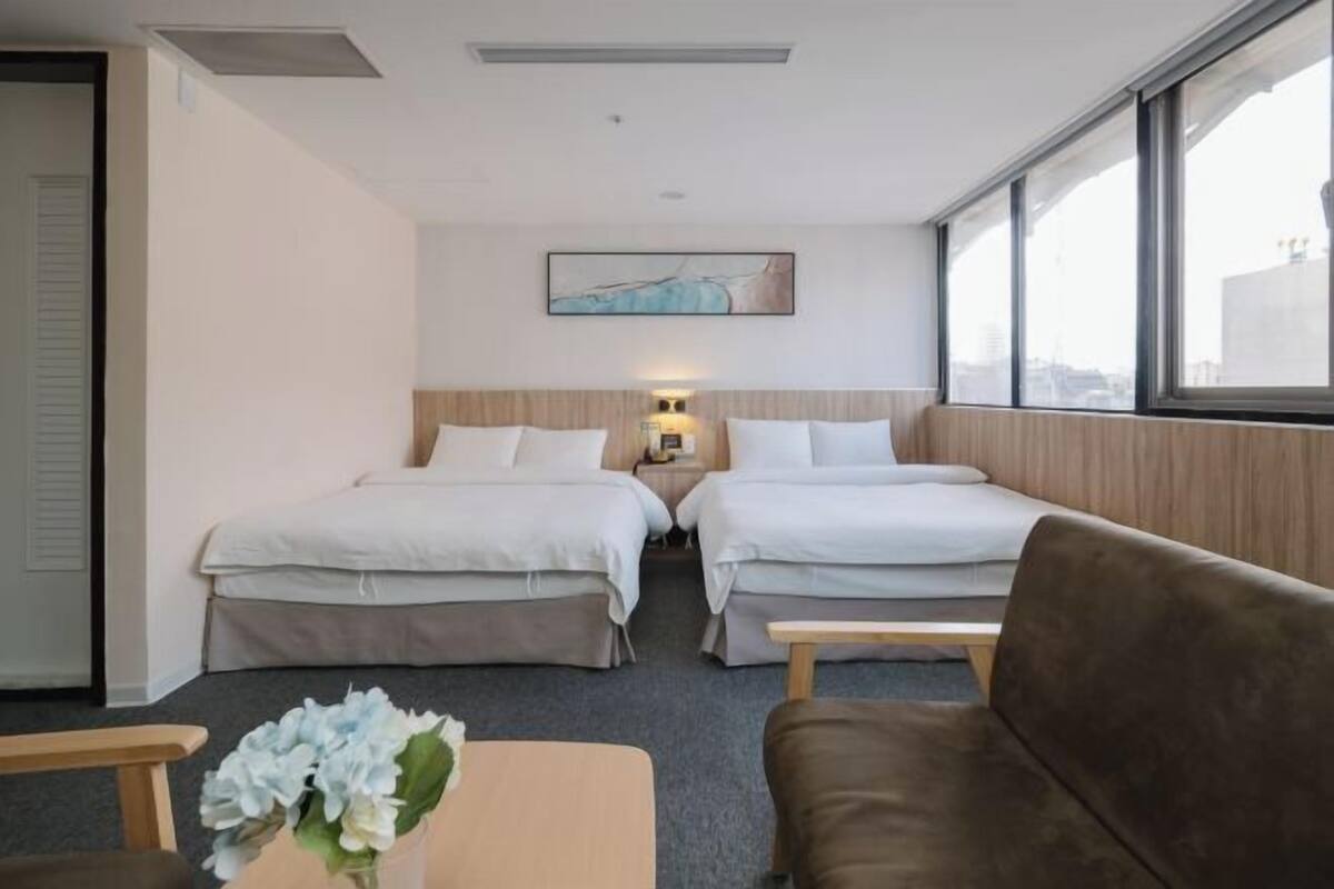 Premium bedding, down duvets, desk, laptop workspace