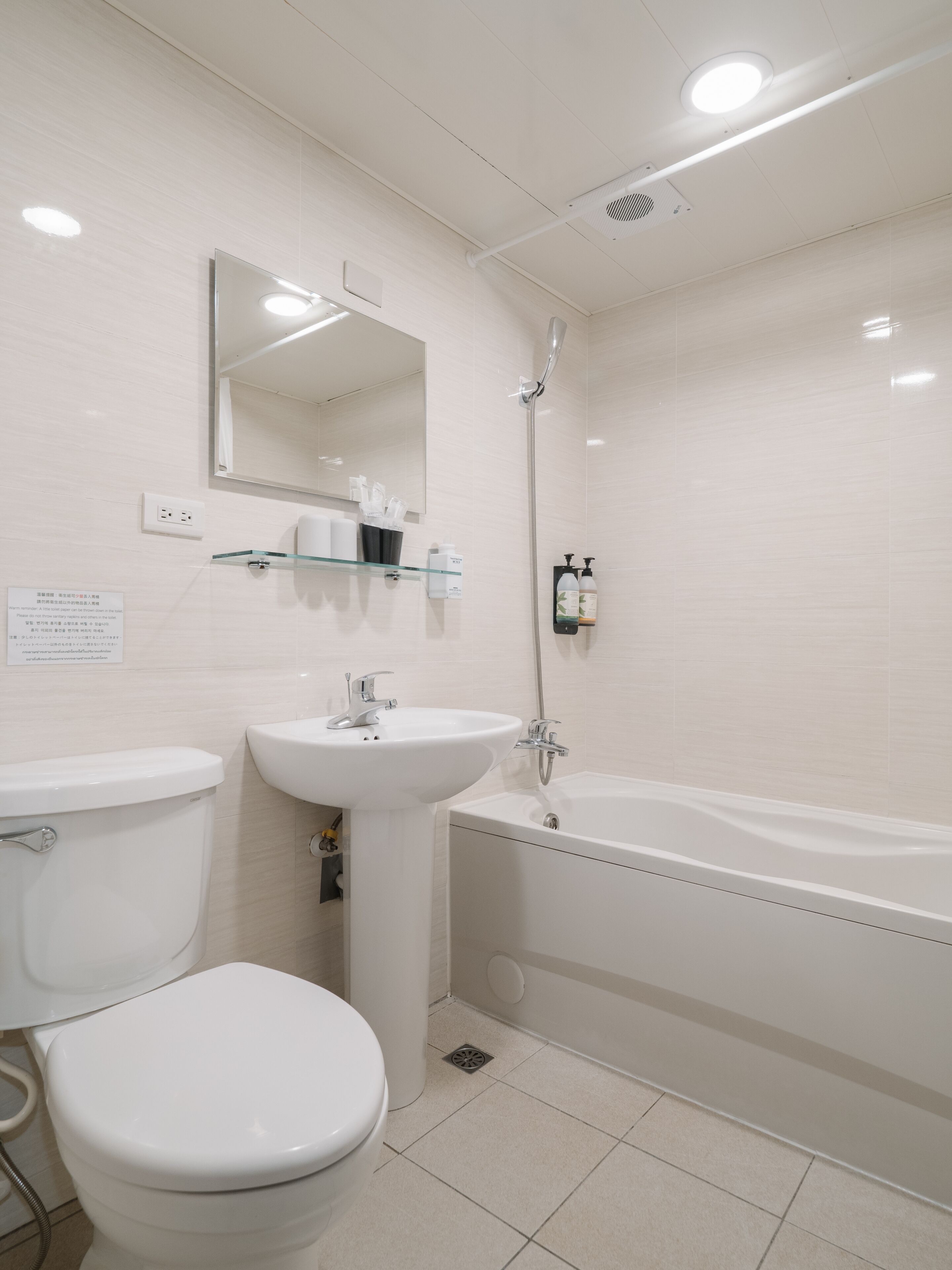 signature double room (no window) | bathroom | combined shower/bathtub, free toiletries, hair dryer, slippers