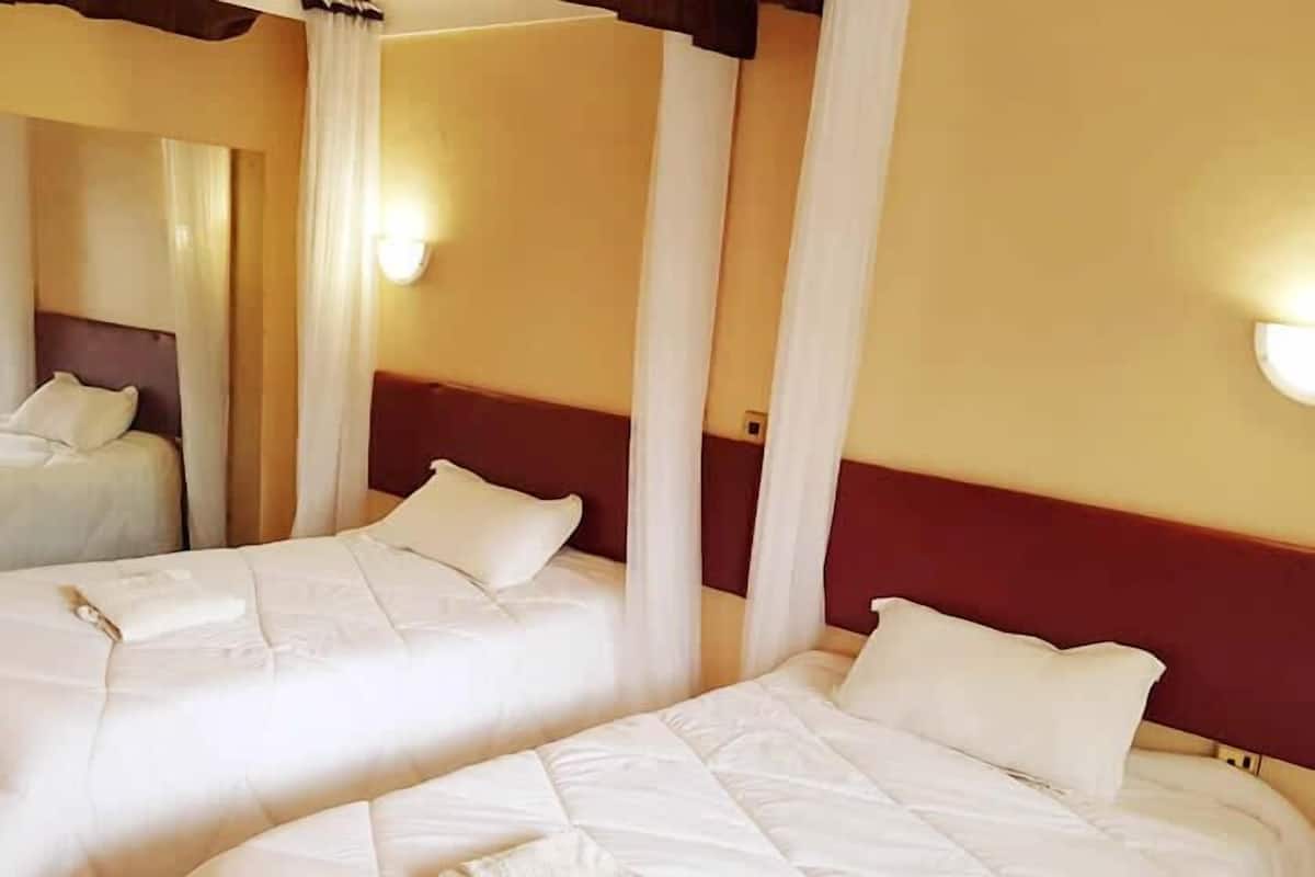 Standard Twin Room, Garden View | In-room safe, desk, bed sheets