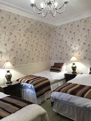 Family Room, Shared Bathroom | Iron/ironing board, bed sheets