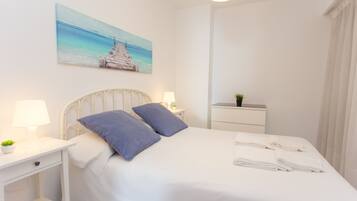 Apartment, 2 Bedrooms, Sea View | 2 bedrooms, desk, iron/ironing board, free cots/infant beds