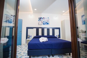 Deluxe kamer, uitzicht op de binnenplaats (Nascosta) | Luxe beddengoed, donsdekens, bedden met traagschuimmatrassen