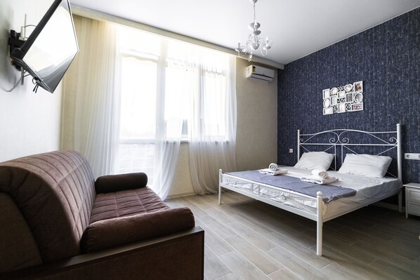 Appartement | Een bureau, een strijkplank/strijkijzer, babybedden, gratis wifi