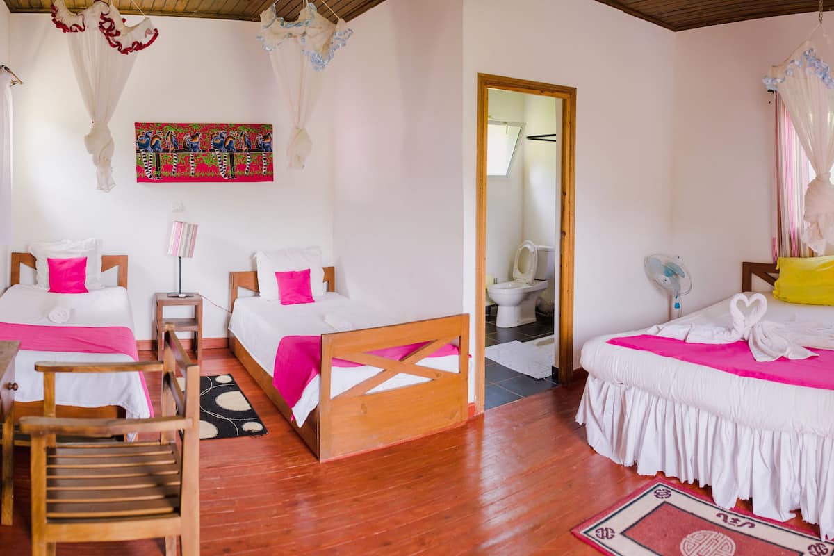 Family Bungalow, River View | Desk, rollaway beds, bed sheets