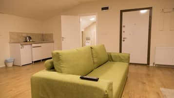 Studio | Pillow-top beds, desk, laptop workspace, soundproofing