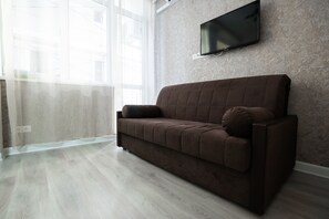 Apartamento, 1 quarto | Escrivaninha, cortinas blackout, ferros/tábuas de passar roupa
