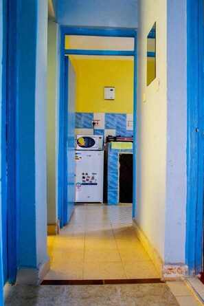 Apartamento | Cozinha privada | Geladeira, micro-ondas, cooktop, chaleira elétrica