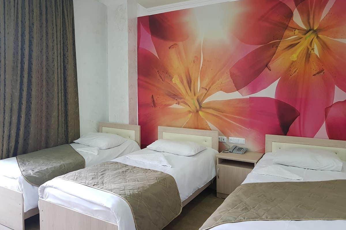 Standard Triple Room | Premium bedding, in-room safe, desk, blackout drapes