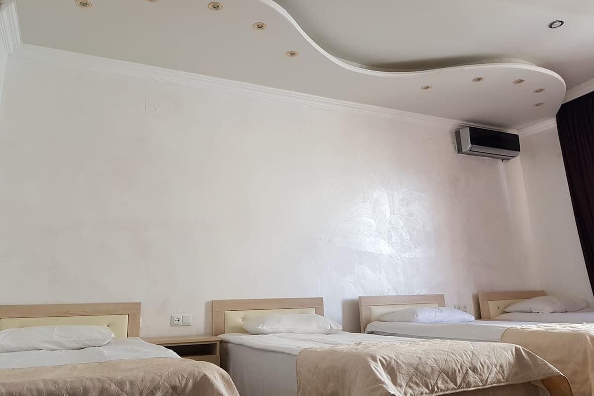Standard Quadruple Room | Premium bedding, in-room safe, desk, blackout drapes