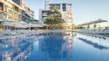 Indoor pool, outdoor pool, open 9:00 AM to 6:00 PM, pool umbrellas