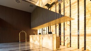 A modern lobby with a reception desk, a staircase, and a polished marble floor. - The Craton Hotel (Istanbul)