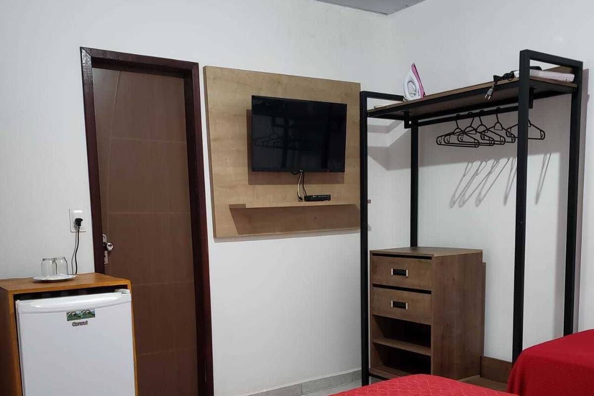 Double or Twin Room | Minibar, blackout curtains, iron/ironing board, bed sheets