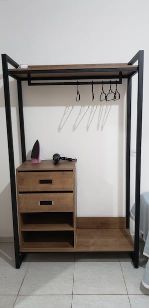 Minibar, blackout drapes, iron/ironing board, bed sheets