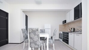 Superior Apartment, Partial Sea View | In-room dining - One Bedroom Apartment Centar C9 (Budva)