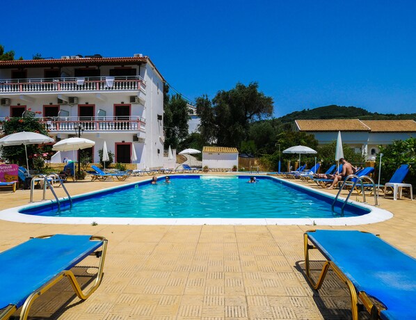 Outdoor pool, pool umbrellas, pool loungers