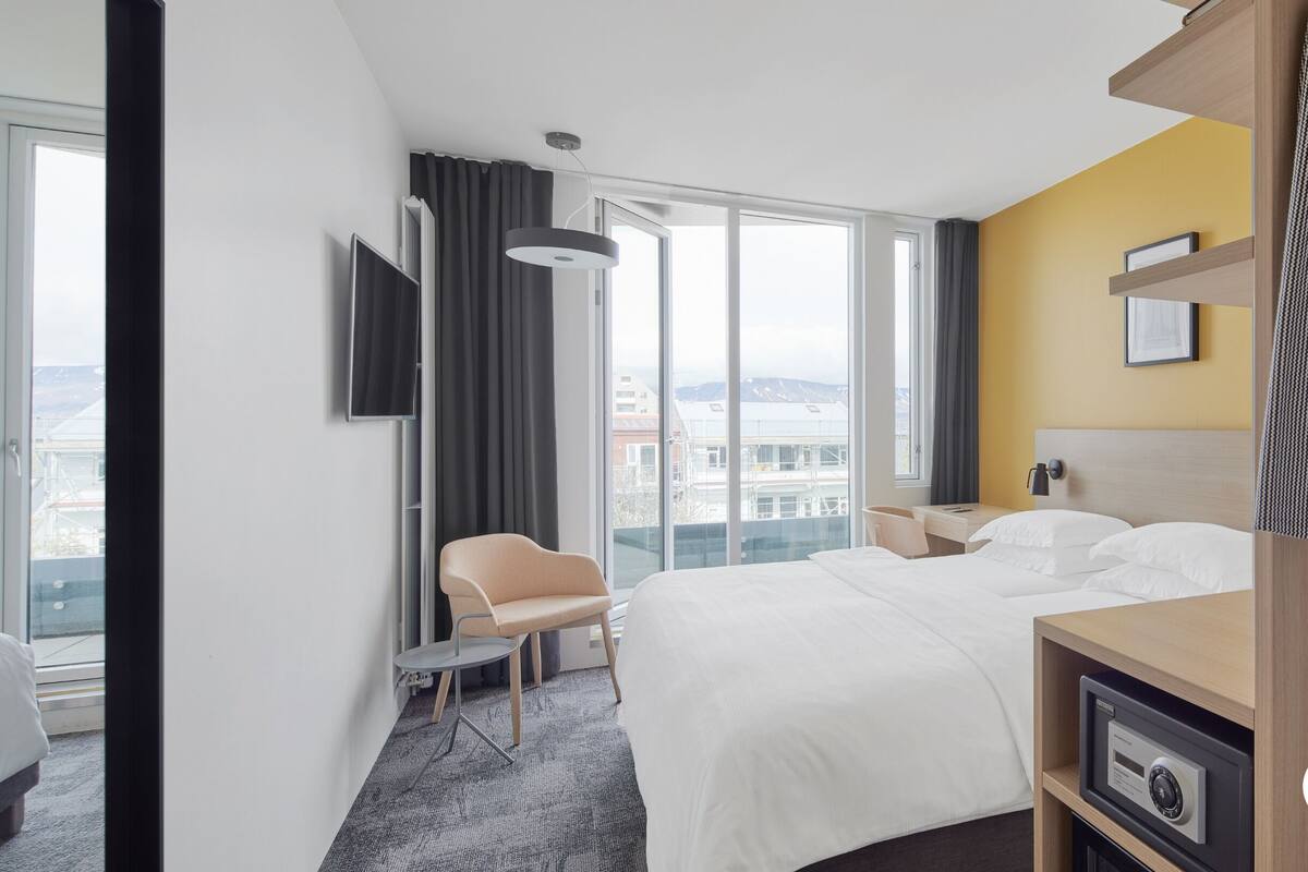 double or twin room, balcony | minibar, in-room safe, desk, laptop workspace