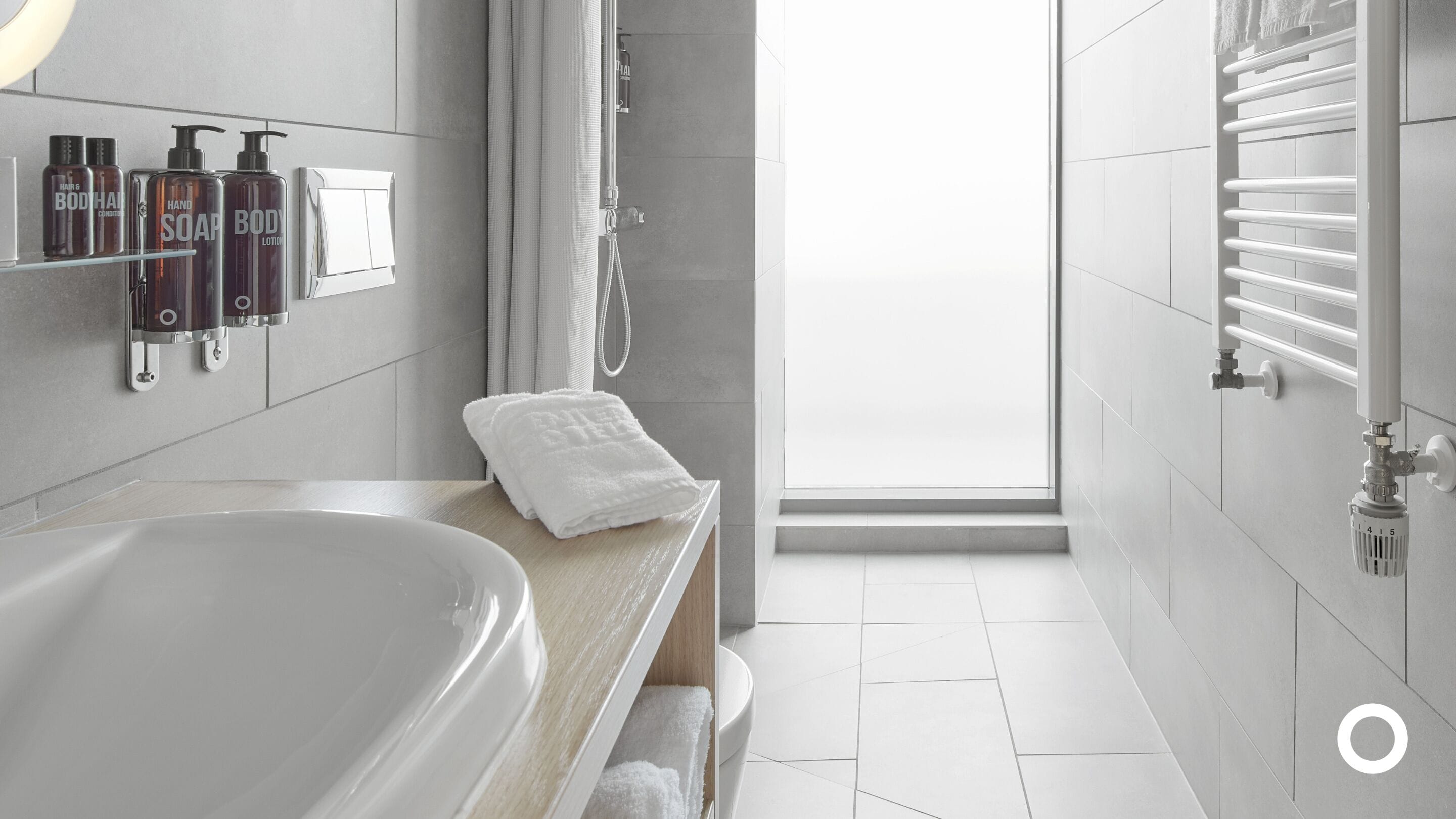 deluxe corner room | bathroom | eco-friendly toiletries, hair dryer, towels, soap