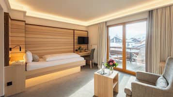 Comfort Plus Einzelzimmer | Allergikerbettwaren, Minibar, Zimmersafe, individuell dekoriert