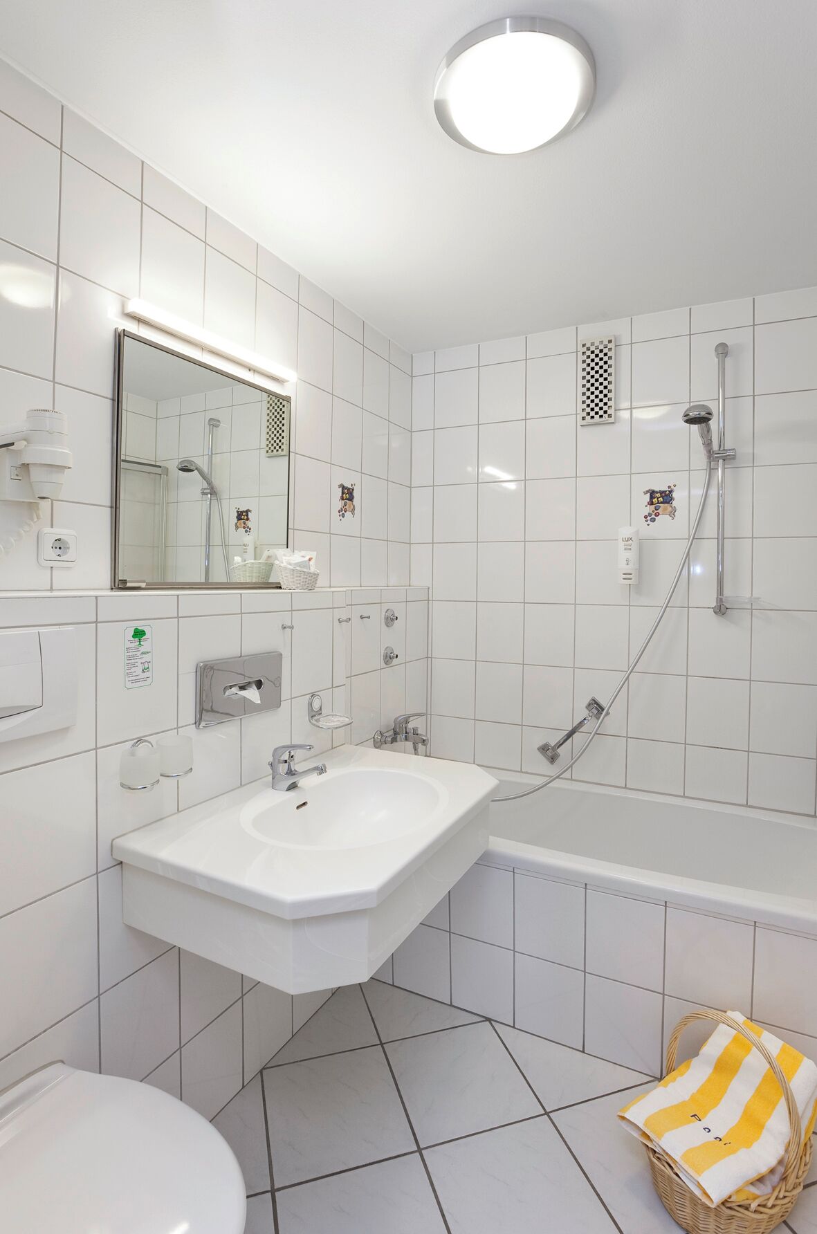 standard double room | bathroom | eco-friendly toiletries, hair dryer, bathrobes, slippers