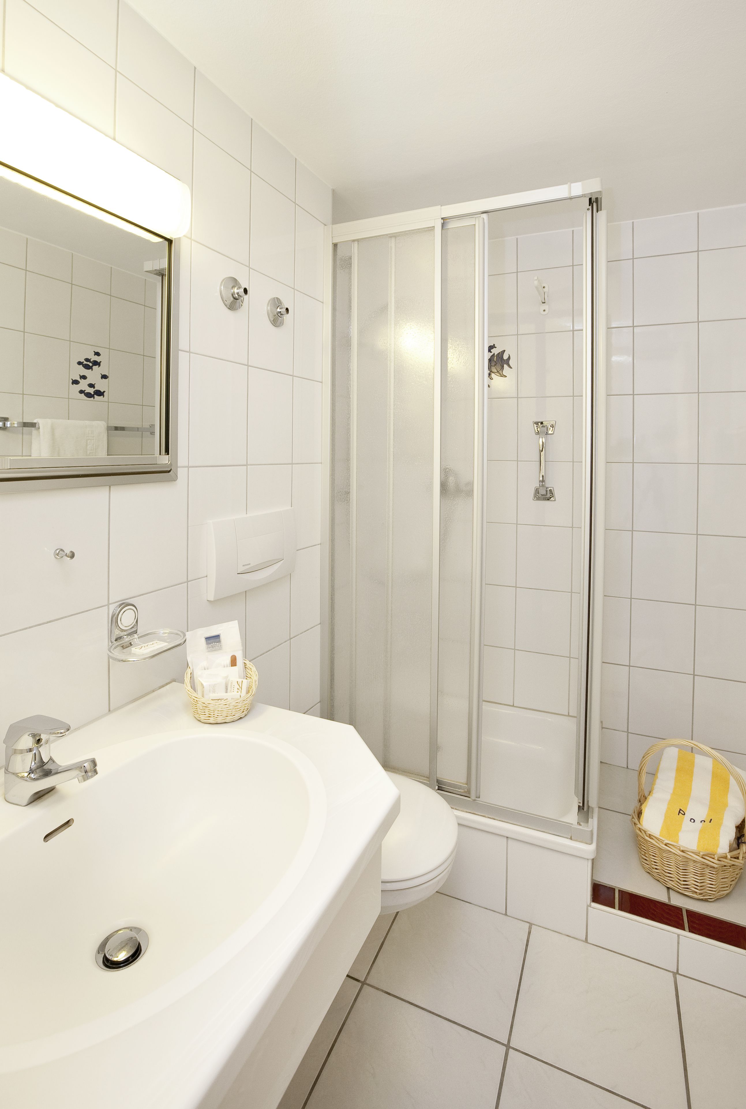 comfort plus single room | bathroom | eco-friendly toiletries, hair dryer, bathrobes, slippers