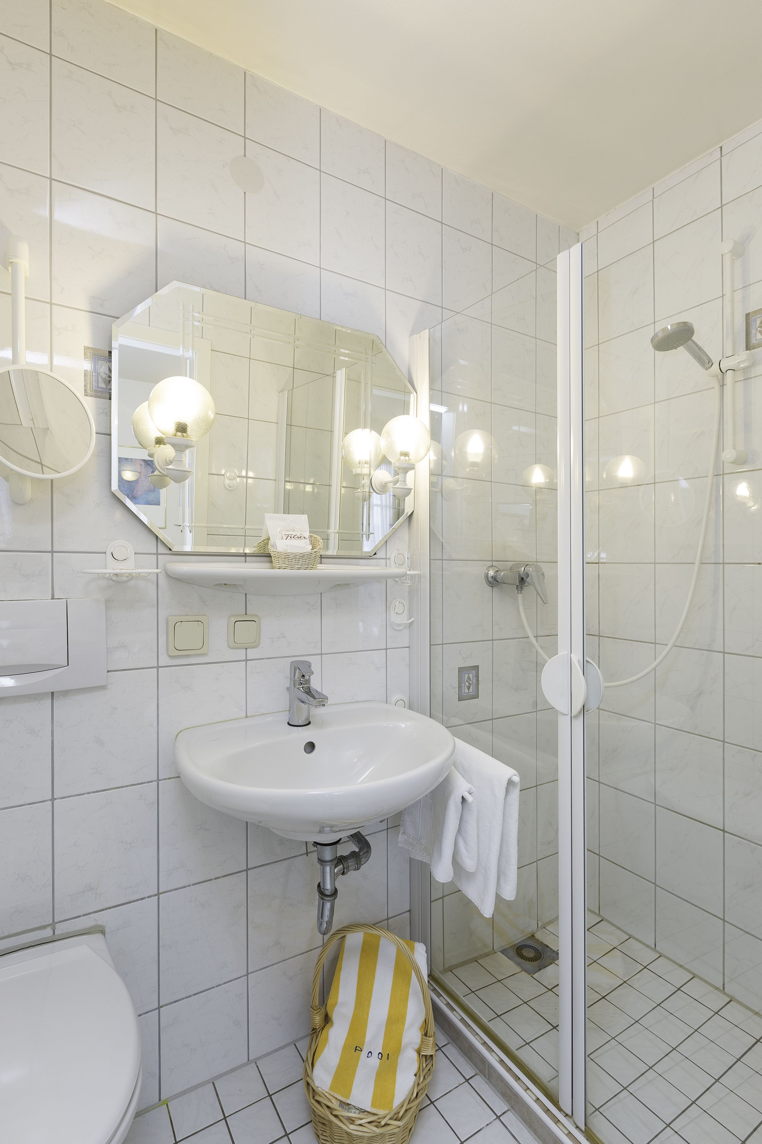 standard single room | bathroom | eco-friendly toiletries, hair dryer, bathrobes, slippers