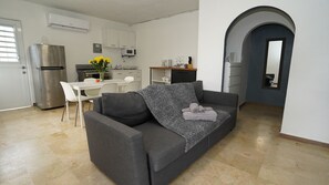 Apartamento família | Área de estar | Smart TV, Netflix