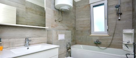 Economy Apartment, Park View | Bathroom | Shower, towels, soap