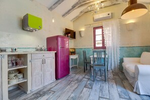 Studio | Cuisine privée | Surface de cuisson, vaisselle et ustensiles