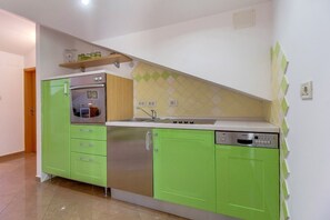 Apartment (2 Bedrooms) | Private kitchen | Fridge, stovetop, coffee/tea maker, electric kettle