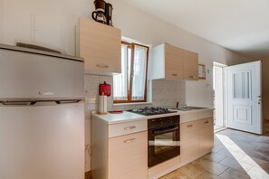 Studio (2 Bedrooms) | Eget pentry | Kylskåp, spishäll och espressobryggare