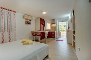 Studio Apartment | 1 bedroom, bed sheets