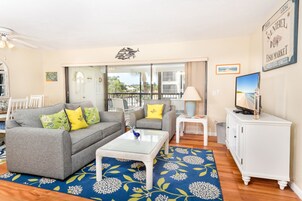 Condo, 2 Bedrooms | Living area | Flat-screen TV