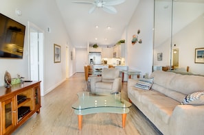 Condo, 2 Bedrooms | Living area | Flat-screen TV, books - Mariner Point 1083 (Sanibel)