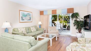 Condo, 2 Bedrooms | Living area | Flat-screen TV